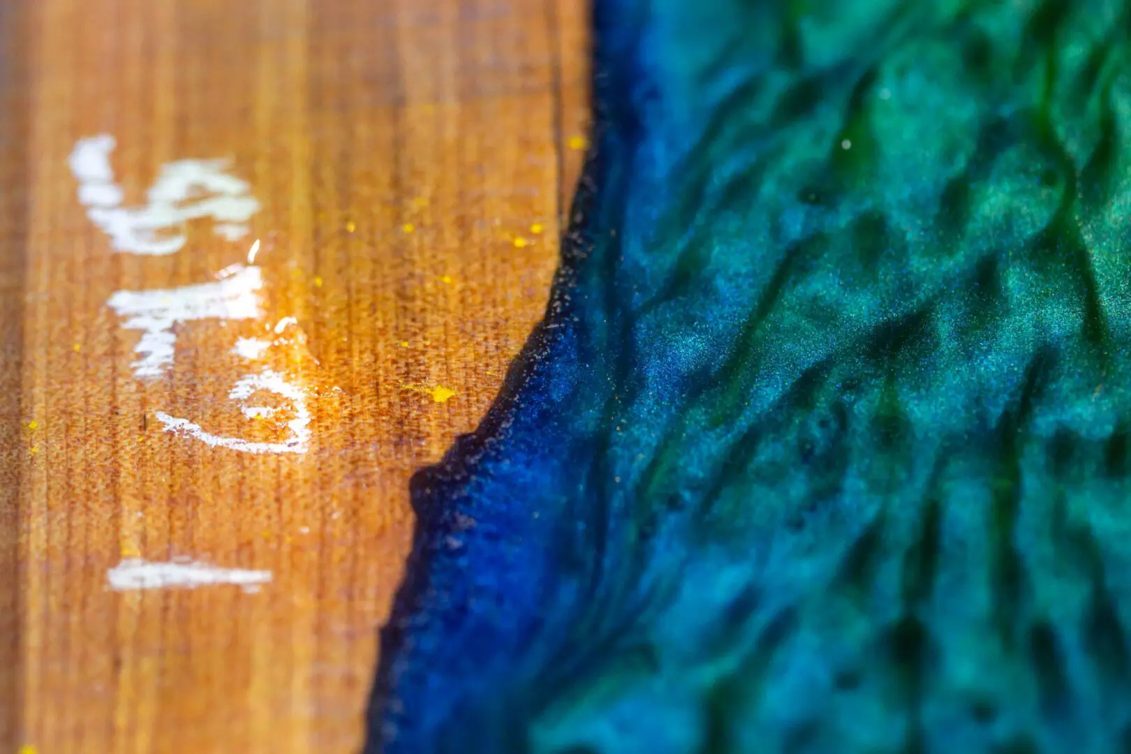 Close-up epoxy resin river table edge
