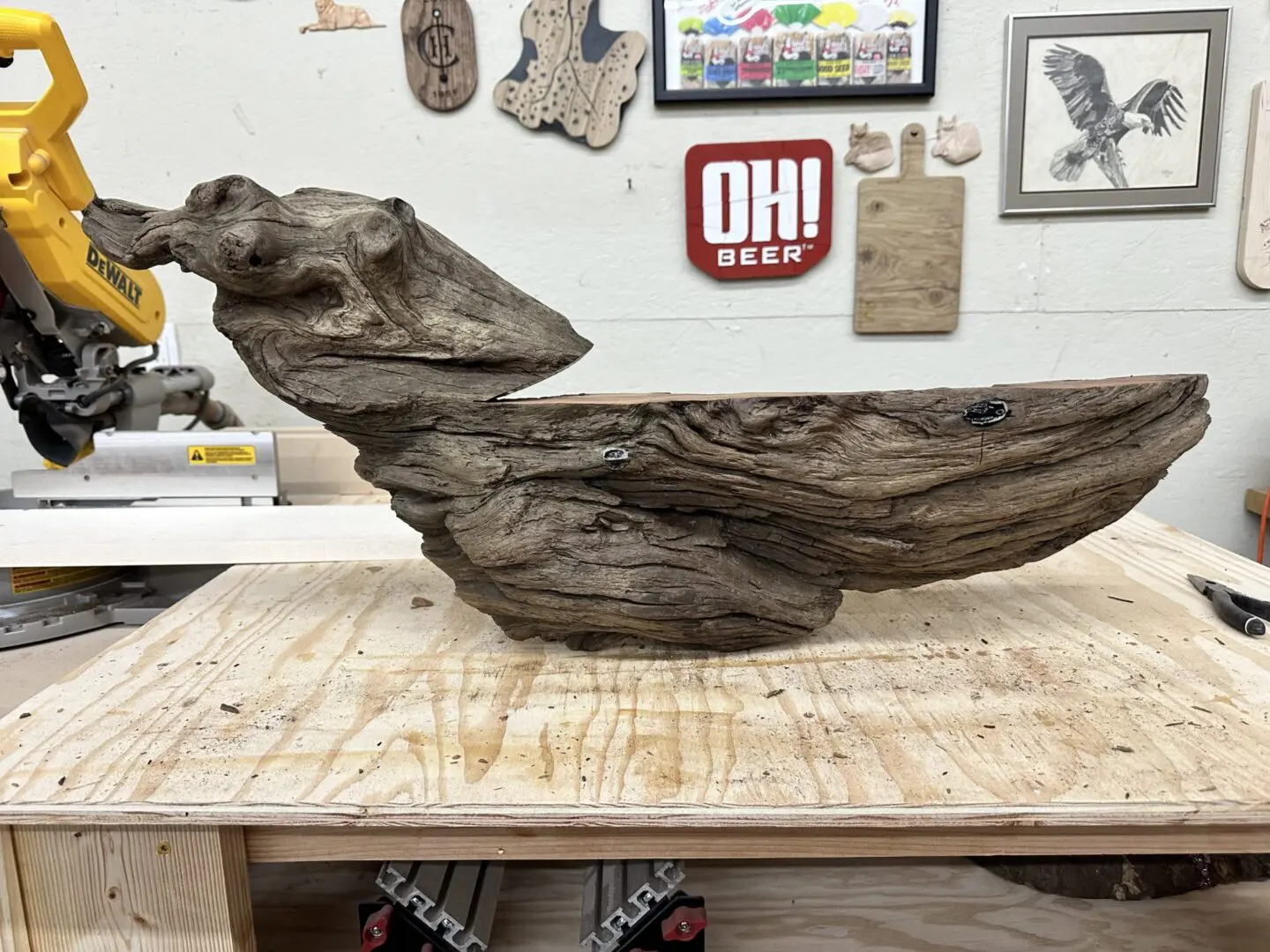 Driftwood sculpture resembling a bird head